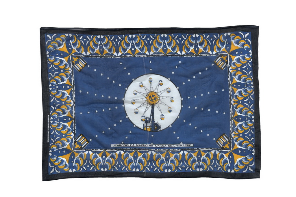 Kanga cloth with the message YOU CAN STARE AT ME, BUT YOU DON'T KNOW WHAT I HAVE